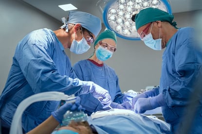 team-of-surgeons-performing-operation-at-hospital-2022-03-07-17-45-16-utc
